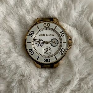 Vincent Camuto white watch face - stainless steel back - water resistant 100ft.